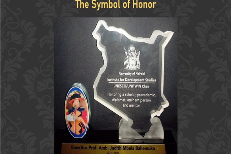 A symbol of honor presented to Emeritus Prof. Amb. Juduth Mbula Bahemuka